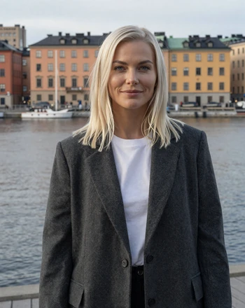 Astrid, 31, Swedish woman from Stockholm with confident smile near the waterfront