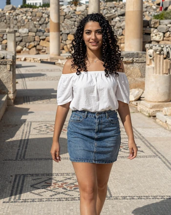 Chrysoula, 25, Cypriot woman from Paphos walking near the archaeological park with ancient mosaics