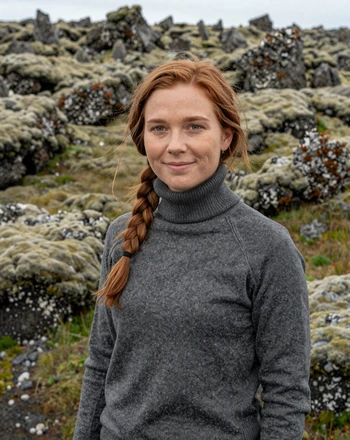 Helga, 29, Icelandic woman from Hafnarfjörður outdoors in a moss-covered lava field landscape