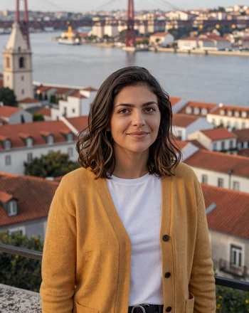 Beatriz, 27, Portuguese woman from Lisbon with gentle smile overlooking red rooftops and the Tagus River