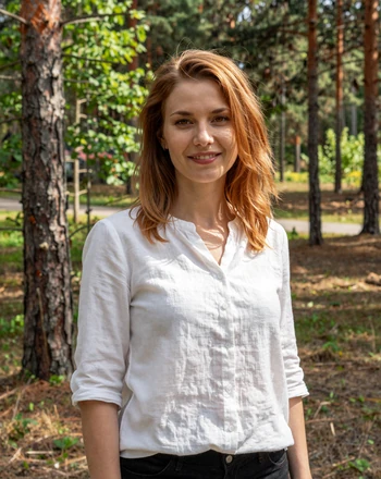 Simona, 31, Lithuanian woman from Druskininkai standing among pine trees in a forest park
